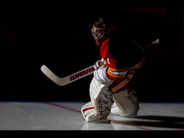 Calgary Flames goalie Brian Elliott hits the ice against the Los Angeles Kings during NHL action in Calgary, Alta., on Sunday, March 19, 2017. Lyle Aspinall/Postmedia Network
