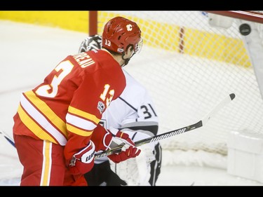 Johnny Gaudreau of the Calgary Flames scores on Los Angeles Kings goalie Ben Bishop during NHL action in Calgary, Alta., on Sunday, March 19, 2017. Lyle Aspinall/Postmedia Network