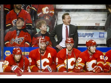 Calgary Flames coach Glen Gulutzan yells to his players during NHL action against the Los Angeles Kings in Calgary, Alta., on Sunday, March 19, 2017. Lyle Aspinall/Postmedia Network