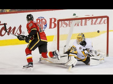 Kris Versteeg of the Calgary Flames scores the lone shootout goal on Pittsburgh Penguins goalie Marc-Andre Fleury during NHL action in Calgary, Alta., on Monday, March 13, 2017. The Flames won 4-3 in a shootout, marking their 10th-straight win and setting a new franchise record. Lyle Aspinall/Postmedia Network