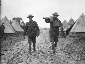 Canadian stretcher bearers return to camp after a hard night.