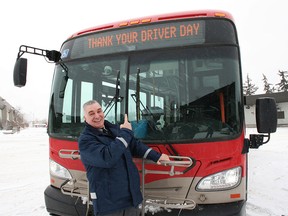 Mike Trigiani stands inf ront of a Calgary bus prior to Thank Your Driver Day. via Ron Collins