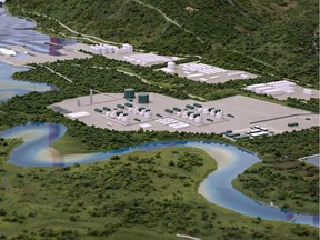 A model at the LNG Canada offices in Kitimat, B.C., shows the proposed liquified natural gas liquification plant and marine terminal, June 26, 2014. The Rio Tinto Alcan smelter is in the background .