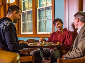 Members of the University of Alberta department of Computing Science and the Computer Poker Research Group plays poker in Edmonton on January 13, 2017. A computer program has learned to win at one of the most complex poker games by copying a very human impulse - trusting its gut.