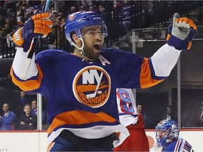 New York islanders forward Andrew Ladd celebrates scoring a goal on the New York Rangers on Feb. 16, 2017, in Brooklyn, N.Y.