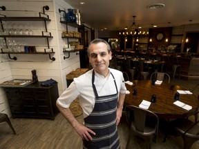 Owner/Chef Giuseppe Di Gennaro of Cotto Italian Comfort Food stands in his restaurant in Calgary, Alta., on Thursday, March 9, 2017. Shot for John Gilchrist restaurant column. Lyle Aspinall/Postmedia Network