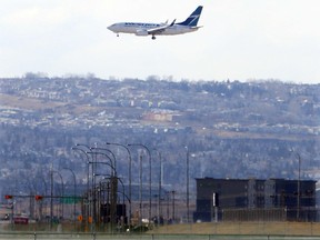 Planes land on the new runway at YYC Calgary International Airport in Calgary, Alta., on March 20, 2017. Thousands of complains of noise have been recorded over the past year from a small number of complaintants about the noise from aircraft. Ryan McLeod/Postmedia Network
