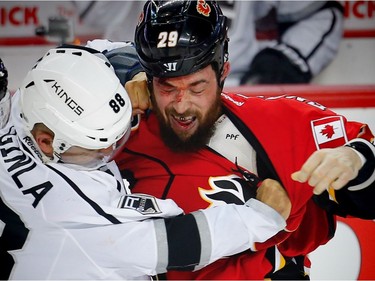 Calgary Flames Deryk Engelland fights Jarome Iginla of the Los Angeles Kings during NHL hockey in Calgary, Alta., on Wednesday, March 29, 2017. AL CHAREST/POSTMEDIA