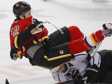 Calgary Flames Matthew Tkachuk collides with Drew Doughty of the Los Angeles Kings during NHL hockey in Calgary, Alta., on Wednesday, March 29, 2017. AL CHAREST/POSTMEDIA