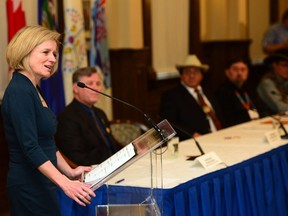 Premier Rachel Notley speaks with the crowd at the McDougall Centre in Calgary, Alta., on March 24, 2017. Ryan McLeod/Postmedia Network