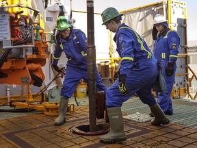 Precision Drilling trainees practice on a rig in Nisku, Alta. The growth of automation and other labour-saving efficiencies could hold back many jobs from returning with the economic recovery.