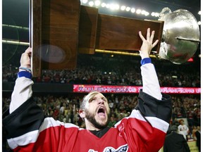 Tracey Kelusky holds the Champions Cup after winning it as the Calgary Roughnecks defeated the New York Titans 12-10 and reclaimed their title as the best in the NNL in May 2009.