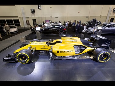 A Renault race car sits on display during the 18th annual Vehicles and Violins gala at the BMO Centre in Calgary, Alta., on Tuesday, March 14, 2017. Vehicles and Violins is a black-tie preview of the 2017 Calgary International Auto and Truck Show, featuring Calgary Philharmonic Orchestra musicians. Lyle Aspinall/Postmedia Network