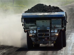 An end dump hauler trucks coal between the Prairie Mines and Royalty's Genesee Mine and Epcor's Genesee Generating Station in this file photo.