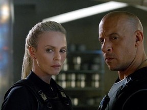 This image released by Universal Pictures shows Charlize Theron, left, and Vin Diesel in &ampquot;The Fate of the Furious.&ampquot; (Universal Pictures via AP)
