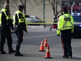 Accident reconstruction team checks out the scene. Ryan McLeod/Postmedia Network