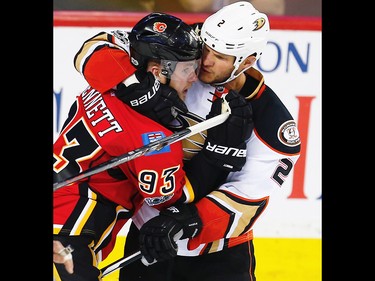 Calgary Flames Sam Bennett battles against Kevin Bieksa of the Anaheim Ducks during 2017 Stanley Cup playoffs in Calgary, Alta., on Monday, April 17, 2017. AL CHAREST/POSTMEDIA