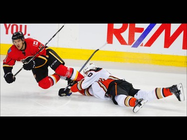 Calgary Flames Mikael Backlund collides with  Corey Perry of the Anaheim Ducks during 2017 Stanley Cup playoffs in Calgary, Alta., on Wednesday, April 19, 2017. AL CHAREST/POSTMEDIA