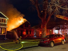 Calgary Firefighters respond to a single home fire in Hillhurst Friday night. Photo supplied by Andy Nichols.