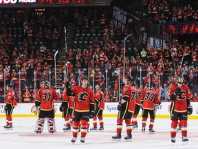 The Calgary Flames salute the crowd after being defeated by the Anaheim Ducks in Game Four of the Western Conference First Round during the 2017 NHL Stanley Cup Playoffs at Scotiabank Saddledome on April 19, 2017.