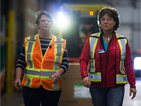 Christy Clark, right, says she would take steps to ban thermal coal shipments through the province if the federal government doesn't act.