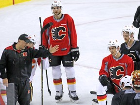 The Calgary Flames listen to head coach Glen Gulutzan during practise at the Scotiabank Saddledome in Calgary on Monday April 10, 2017. The Flames begin their playoff run against the Ducks in Anaheim on Thursday.