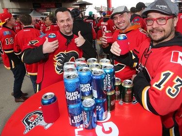 Flames fans get hydrated at the playoff tailgate party before game 3 against the Anaheim Ducks at the Scotiabank Saddledome in Calgary on Monday April 17, 2017. Gavin Young/Postmedia Network