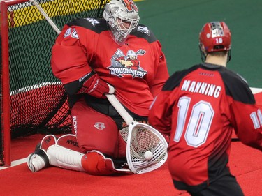 Calgary Roughnecks goaltender Frank Scigliano stops this scoring chance by the Saskatchewan Rush during National Lacrosse League action in Calgary on Saturday April 29, 2017.