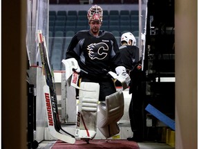 Calgary Flames goalie Brian Elliott leaves the ice after practice at the Scotiabank Saddledome in Calgary on Tuesday, April 11, 2017. (Leah Hennel)