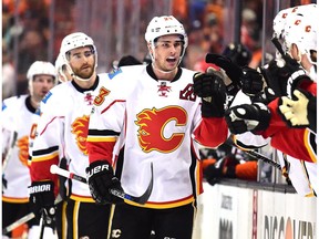 Sean Monohan #23 of the Calgary Flames celebrates his goal with his bench to tie the game 1-1 with the Anaheim Ducks during the first period in Game One of the Western Conference First Round during the 2017 NHL Stanley Cup Playoffs at Honda Center on April 13, 2017 in Anaheim, California.