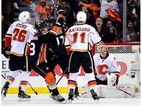 Brian Elliott #1 of the Calgary Flames reacts to a goal from Jakob Silfverberg #33 of the Anaheim Ducks to take a 3-2 lead during the second period in Game One of the Western Conference First Round during the 2017 NHL Stanley Cup Playoffs at Honda Center on April 13, 2017 in Anaheim, California.