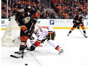 Ryan Kesler of the Anaheim Ducks skates past Calgary Flames defender Mark Giordano on the way to a 3-2 Ducks' win in Game 1 of their opening-round playoff series at Honda Center on April 13, 2017, in Anaheim, Calif. (Getty Images)