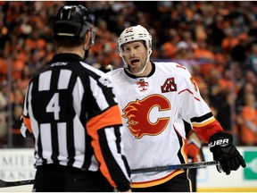 Troy Brouwer #36 of the Calgary Flames talks with referee Wes McCauley during the second period of Game Two of the Western Conference First Round against the Anaheim Ducks during the 2017 NHL Stanley Cup Playoffs at Honda Center on April 15, 2017 in Anaheim, California.