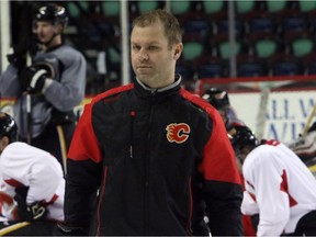 Calgary Flames goalie coach Jordan Sigalet on the ice during practice at the Scotiabank Saddledome in Calgary on January 4, 2016.  (Christina Ryan/Calgary Herald) (For Sports section story by Kristen Odland) Trax# 00071118A