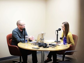 Postmedia's Trevor Howell and Annalise Klingbeil prep for the first episode of The Confluence podcast.