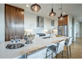 The kitchen in the Cayenne villa show home by NuVista Homes in Harmony.