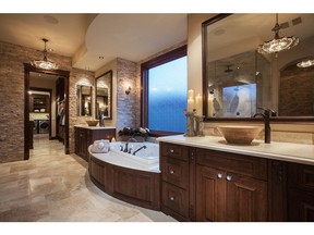 The ensuite in a private residence in the Calgary community of Eagle Ridge by Wolf Custom Homes.