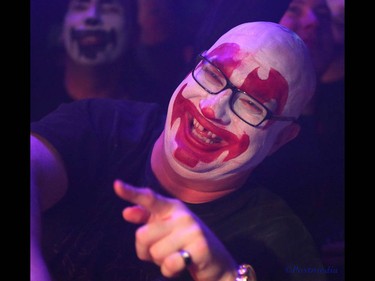 A Juggalo laughs as he watches a stage show during day two of the Insane Clown Posse Juggalo Weekend held at the Marquee Beer Market in Calgary, Alta on Saturday April 8, 2017. The two day festival, the first in Canada is headlined by ICP, and includes a number of other heavy metal, gangsta rap, DJs, wrestlers, and circus performers. Jim Wells//Postmedia