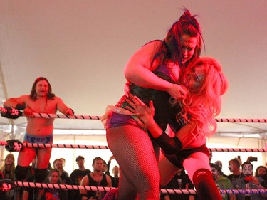 Wrestlers grapple under the Big Top during day two of the Insane Clown Posse Juggalo Weekend held at the Marquee Beer Market in Calgary, Alta on Saturday April 8, 2017. The two day festival, the first in Canada is headlined by ICP, and includes a number of other heavy metal, gangsta rap, DJs, wrestlers, and circus performers. Jim Wells//Postmedia