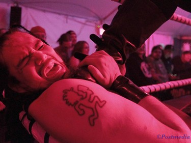 Mosh Pit Mike takes a boot to the throat during day two of the Insane Clown Posse Juggalo Weekend held at the Marquee Beer Market in Calgary, Alta on Saturday April 8, 2017. The two day festival, the first in Canada is headlined by ICP, and includes a number of other heavy metal, gangsta rap, DJs, wrestlers, and circus performers. Jim Wells//Postmedia