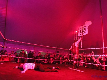 Mosh Pit Mike celebrates the win and the referee is down and out during day two of the Insane Clown Posse Juggalo Weekend held at the Marquee Beer Market in Calgary, Alta on Saturday April 8, 2017. The two day festival, the first in Canada is headlined by ICP, and includes a number of other heavy metal, gangsta rap, DJs, wrestlers, and circus performers. Jim Wells//Postmedia