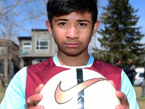 Moneer Mahalhel at the Glenbrook Community Association field in Calgary, Alta., on April 17, 2017. Mahalhel is a 14-year-old soccer prospect who recently returned from a camp held by West Ham United's Academy (English Premier League). At 9-years-old Mahalhel was introduced to the sport of soccer by Jean-Claude Munyezamu from Soccer Without Boundaries. Soccer Without Boundaries brings kids together from all nationalities and walks of life around sports. Ryan McLeod/Postmedia Network