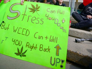 Signs and smoke filled the grounds outside of City Hall. Calgary pot advocates and users alike joined in the 4/20 (April 20) celebration of cannabis culture on April 20, 2017 at City Hall. Ryan McLeod/Postmedia Network