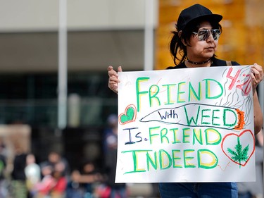 Signs and smoke filled the grounds outside of City Hall. Calgary pot advocates and users alike joined in the 4/20 (April 20) celebration of cannabis culture on April 20, 2017 at City Hall. Ryan McLeod/Postmedia Network