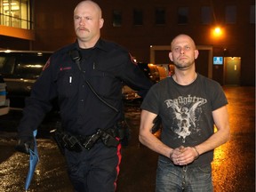 Allan Shyback is taken into custody in Calgary on December 6, 2014, charged with second murder.