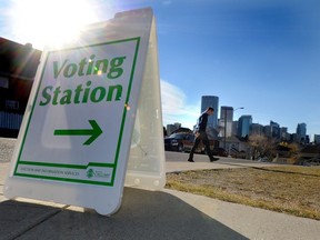 A man goes to vote for the civic election at Langevin school on Centre Ave East and 6A street in NE Calgary, Alta. on Monday October 21, 2013.