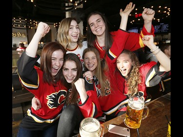 Calgary Flames fans are cheer on their team during Game 4 against the Ducks at The National on the Red Mile on Wednesday April 19, 2017. DARREN MAKOWICHUK/Postmedia Network