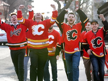 Calgary Flames fans make some noise as they head to the Scotiabank Saddledome for Game 4 against the Ducks along the Red Mile on Wednesday April 19, 2017. DARREN MAKOWICHUK/Postmedia Network