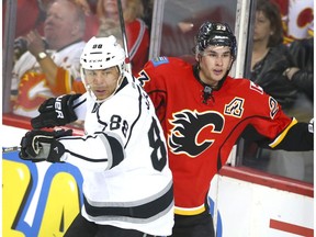 Kings Jarome Iginla tangles with Flames Sean Monahan during NHL action between the Los Angeles Kings and the Calgary Flames in Calgary, Alta. on Wednesday March 29, 2017.