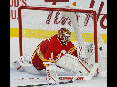 Calgary Flames Brian Elliott gives up a goal to Anaheim Ducks during NHL hockey in Calgary, Alta., on Sunday, April 2, 2017. AL CHAREST/POSTMEDIA